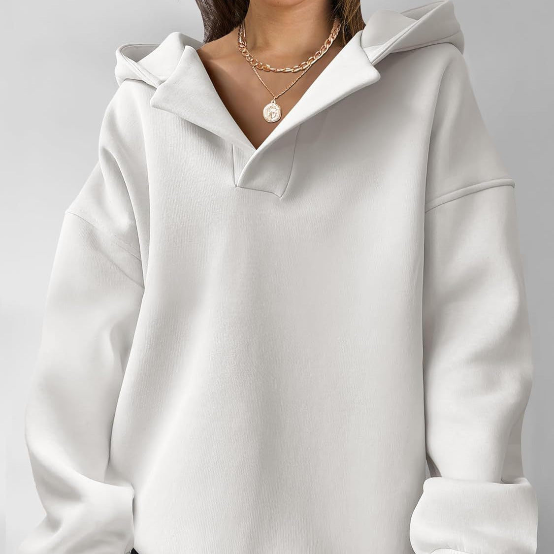 Donna - Maglia oversize con cappuccio e scollo a V