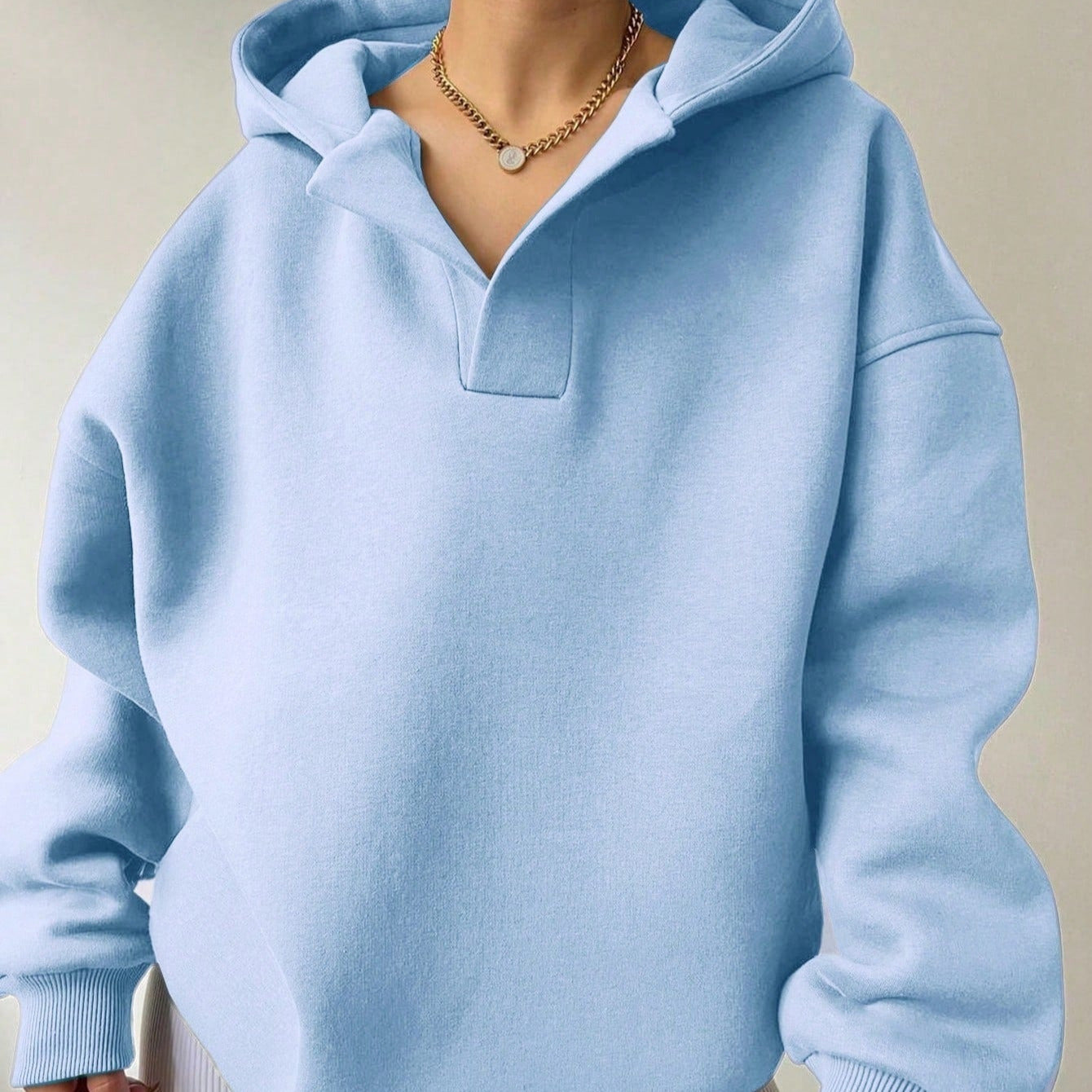 Donna - Maglia oversize con cappuccio e scollo a V